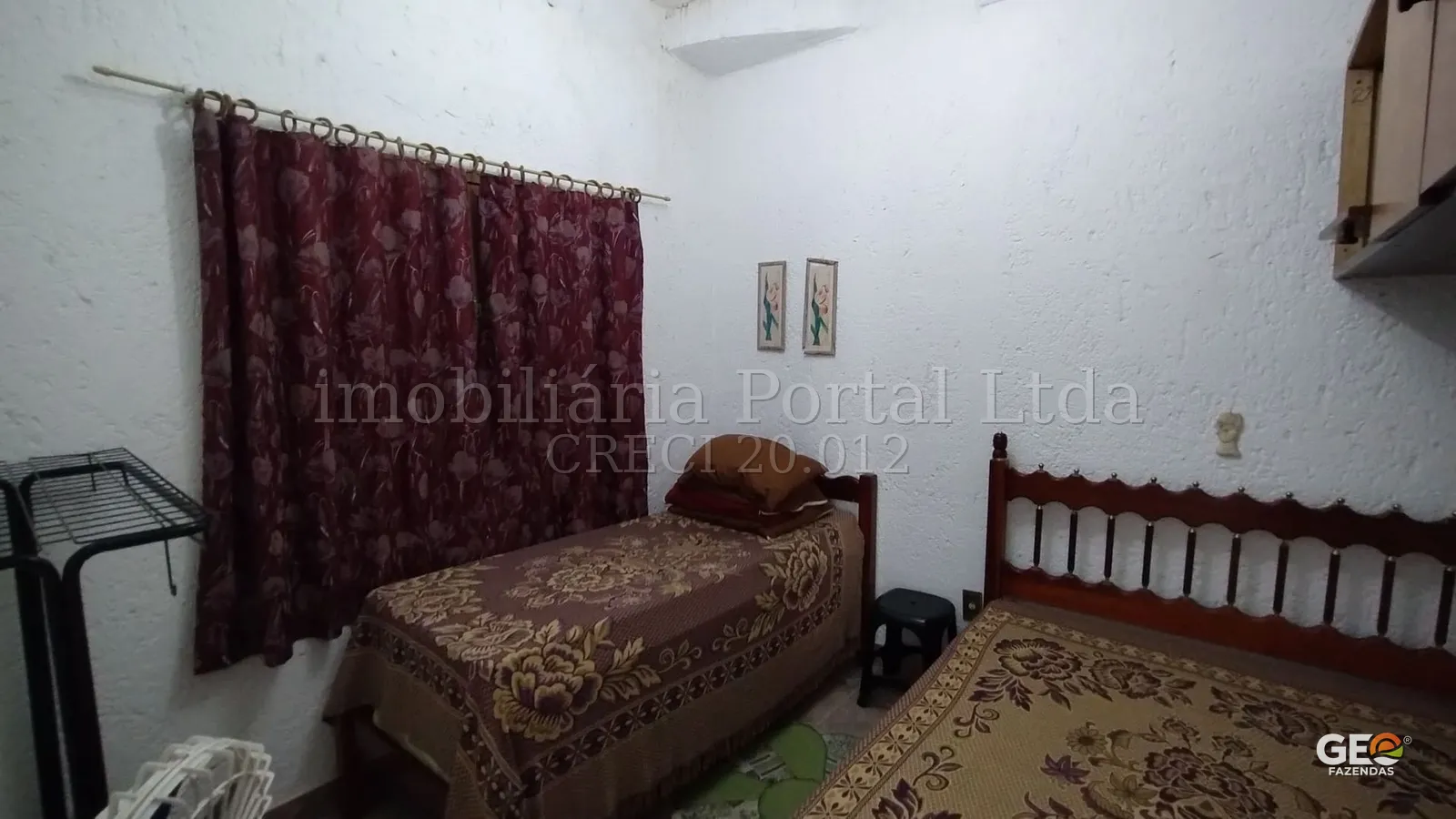 Quarto simples em propriedade rural
